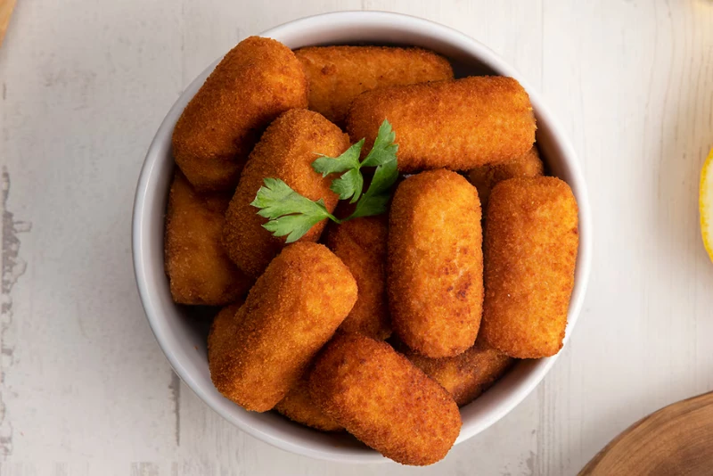 Croquetas de Salmón Ahumado Sauté - Plato servido